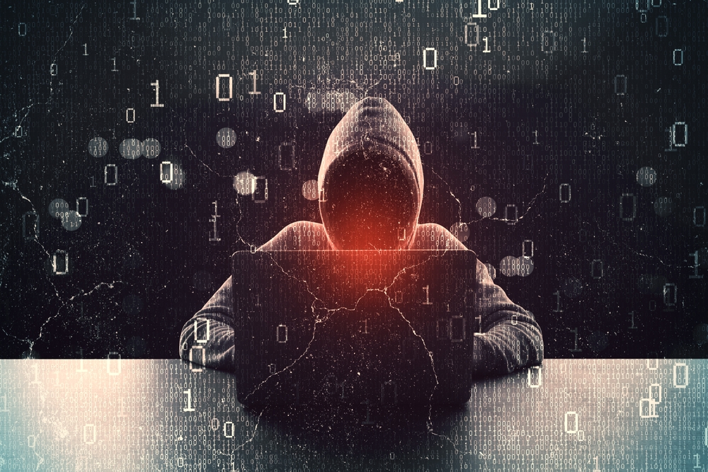 Hacker,In,Hoodie,Standing,On,Abstract,Dark,Hacking,Background,With