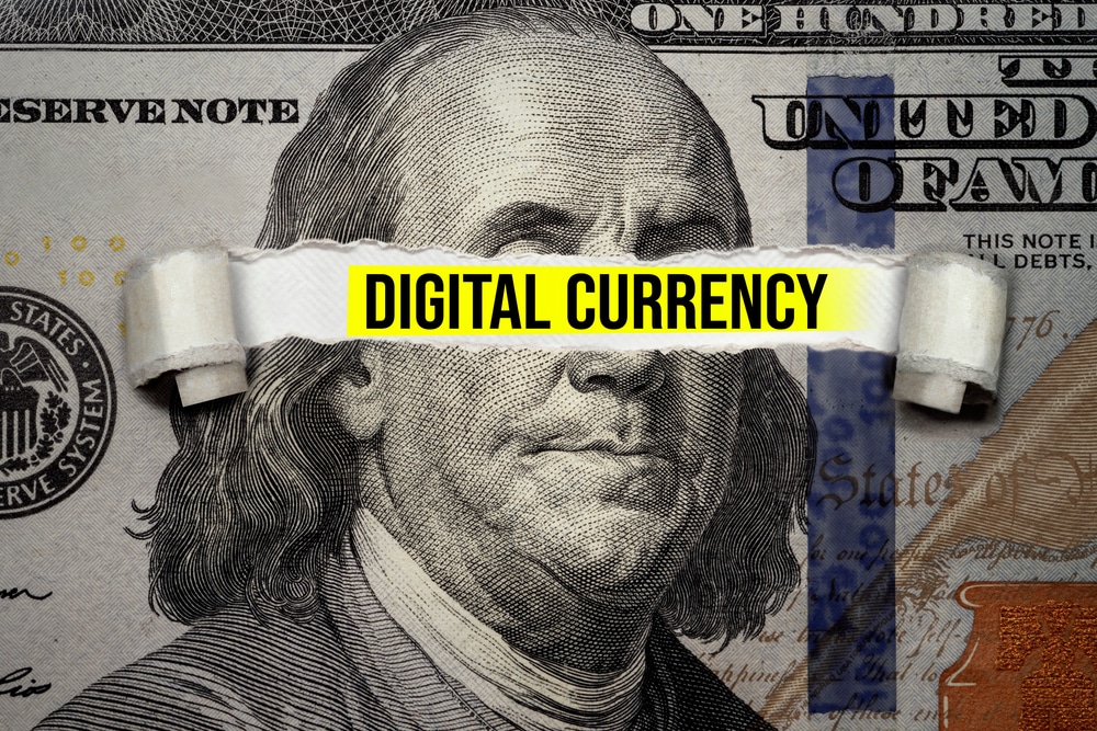 Digital Dollar Reset concept showing Benjamin Franklin on a $100 bill with the words "Digital Currency" symbolizing CBDC risks, FedNow, and programmable money.