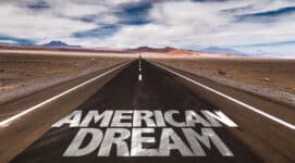 American Dream text painted on an empty highway symbolizing collapsing consumer confidence and economic uncertainty in America