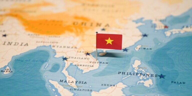 The,Flag,Of,Vietnam,On,The,World,Map.