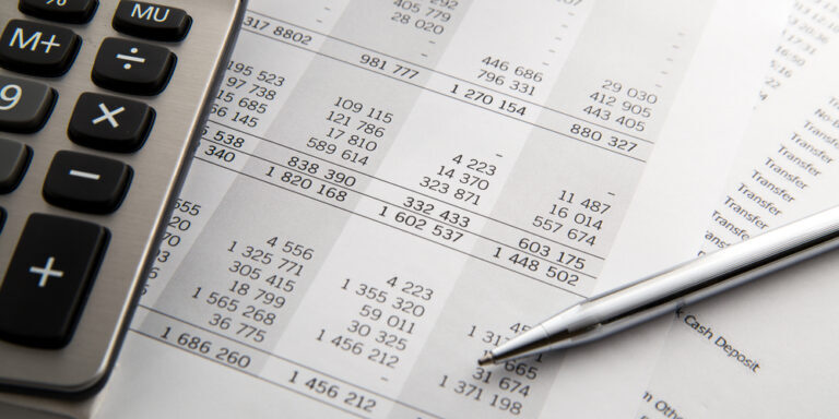 Pen,,Calculator,On,The,Financial,Account,Documents.,Financial,Concept