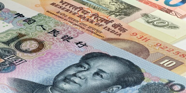 Bank,Notes,Of,The,Bric,States,On,White,Background