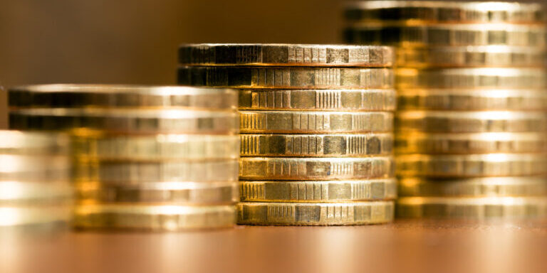 Stacks,Of,Gold,Coins,Of,Varying,Heights