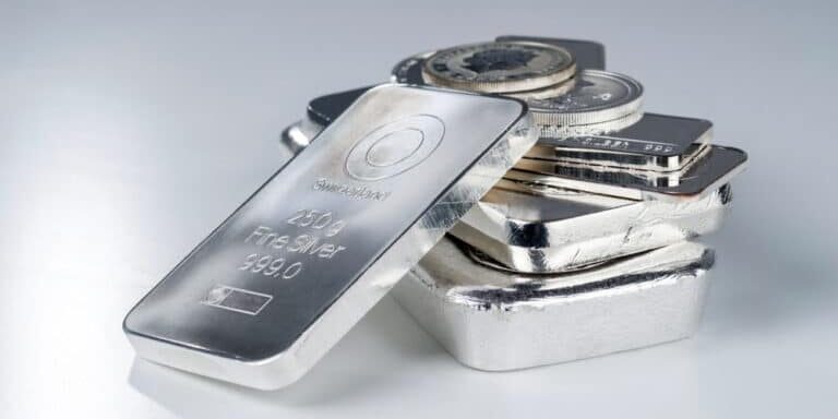 Silver,Bullion.,Cast,And,Minted,Bars,And,Coins,On,A