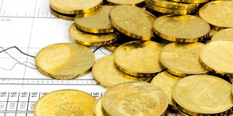 Lot,Of,Golden,Coins,Concept,On,Business,Background