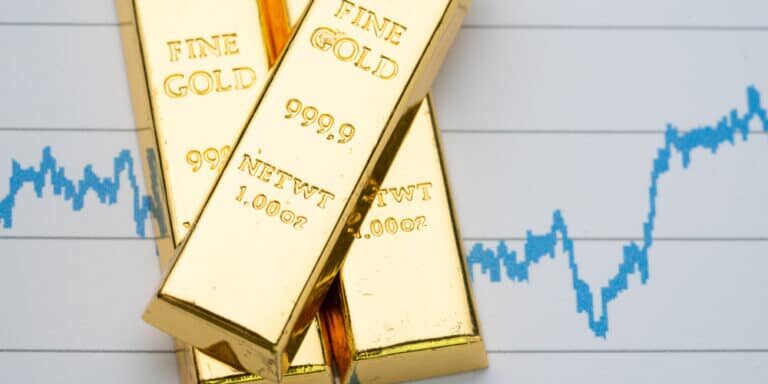 Gold,Bar,,Bullion,Stack,On,Rising,Price,Graph,As,Financial Gold,Bar,,Bullion,Stack,On,Rising,Price,Graph,As,Financial