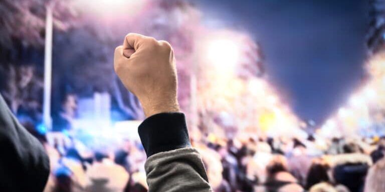 Protest,,Uprising,,March,Or,Strike,In,City,Street.,Crowd,Of