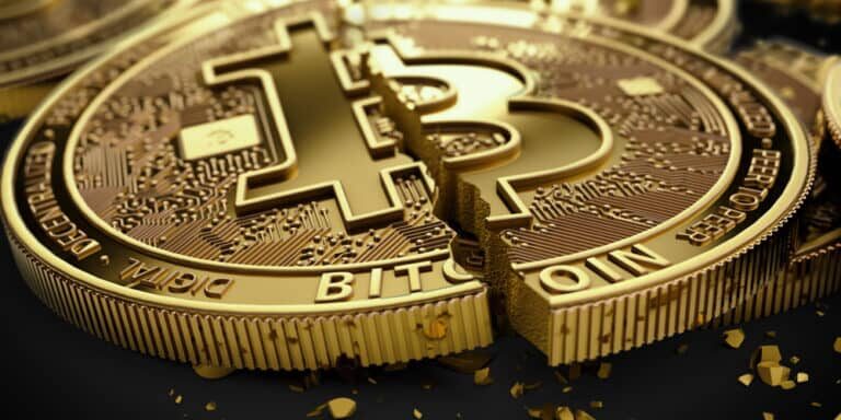 Close-up,Shot,On,Broken,Or,Cracked,Bitcoin,Coins,Laying,On