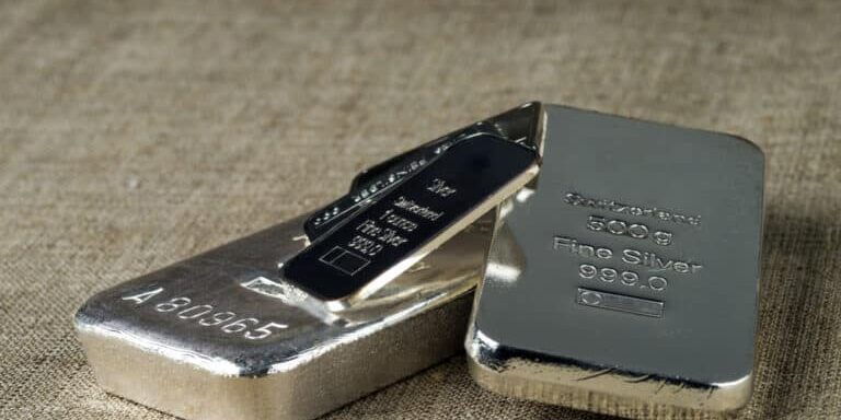 Several,Different,Silver,Bullion,Against,The,Background,Of,The,Texture