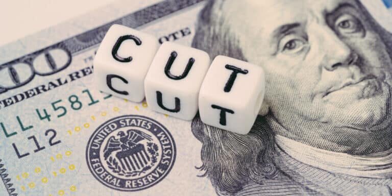 Fed,,Federal,Reserve,With,Interest,Rate,Cut,Concept,,Small,Cube