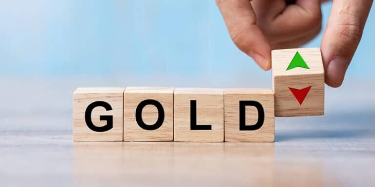 Business,Man,Hand,Change,Wood,Cube,Block,With,Gold,Text