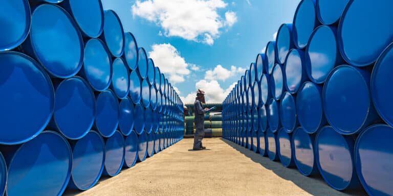 Male,Worker,Inspection,Record,Drum,Oil,Stock,Barrels,Blue,Horizontal