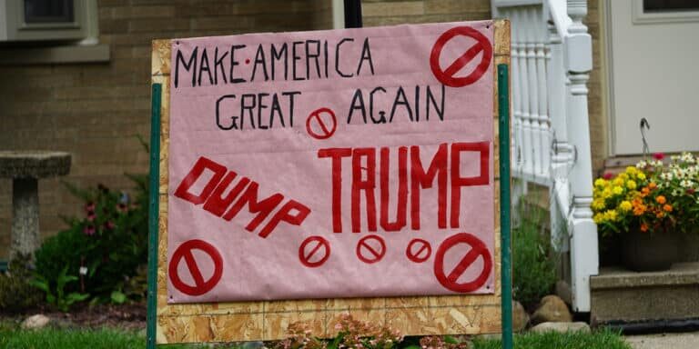 Anti-trump,Sign,Sits,In,A,Yard,Of,A,Democrat