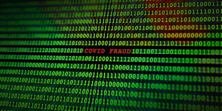 Covid-19,Fraud,Scam,On,A,Binary,Monitor,Screen
