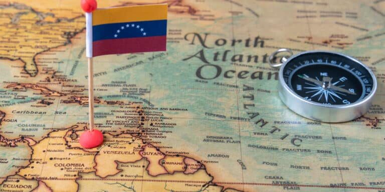 Flag,Of,Venezuela,And,Compass,On,The,World,Map.,The