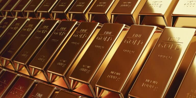 Gold bars stacked inside a vault illustrating the latest gold price forecast amid inflation fears, central bank uncertainty, and global financial instability