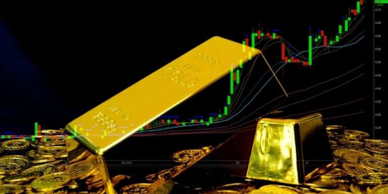 Gold,Bullion,On,Pile,Gold,Coins,At,Trading,Chart,Background