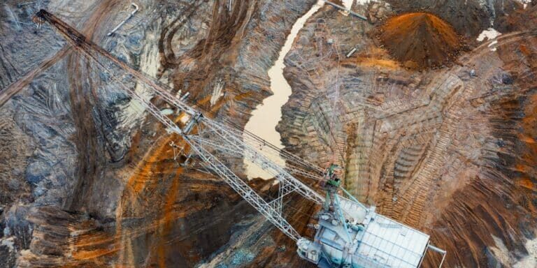 A,Large,Walking,Excavator,Works,In,A,Quarry,For,The