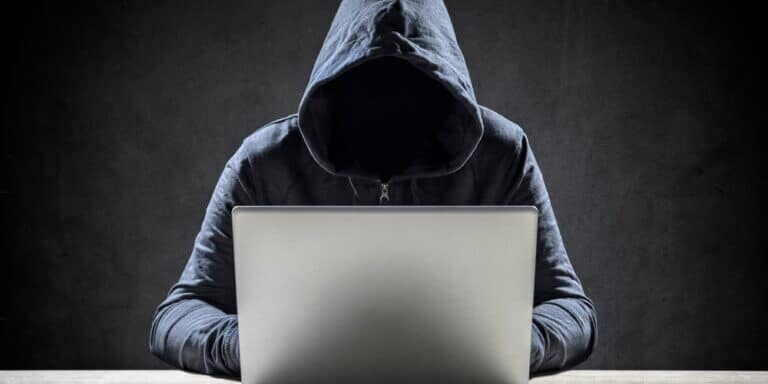 Computer,Hacker,Stealing,Data,From,A,Laptop,Concept,For,Network