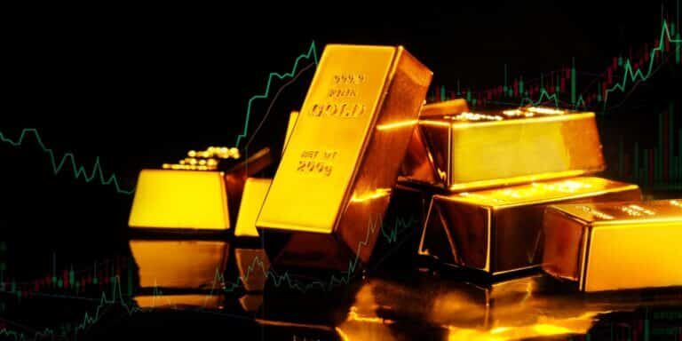 Gold,Bars,On,A,White,Background,,Business,And,Financial,Concepts.