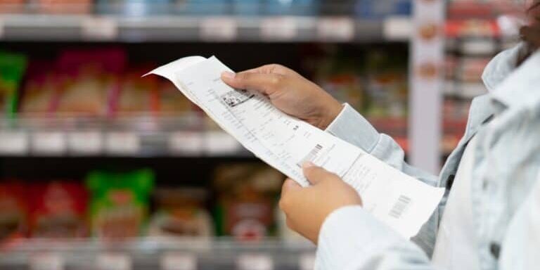Inflation,Effect,,Women,Customer,Checking,Product,Bills,After,Shopping,And