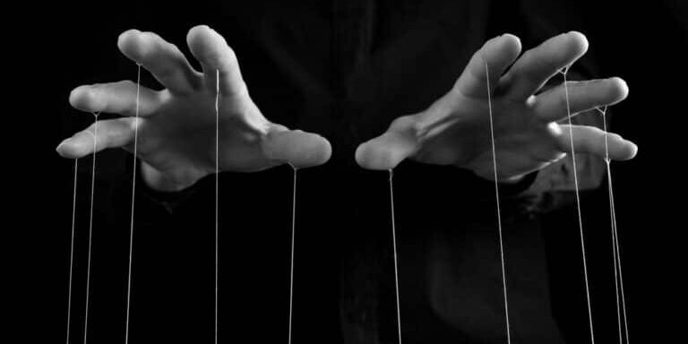 Man,Hands,With,Strings,On,Fingers.,Negative,Abusive,Relationship,,Manipulation,
