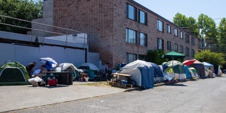 Seattle,,Washington,-,July,07,2022:,Homeless,Encampment,Shelter,Tents Seattle,,Washington,-,July,07,2022:,Homeless,Encampment,Shelter,Tents