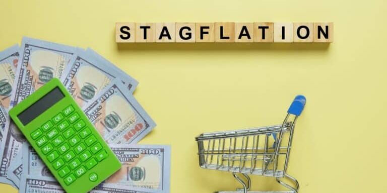 Flatlay,Picture,Of,Wooden,Block,Written,Stagflation,,Cart,,Fake,Money