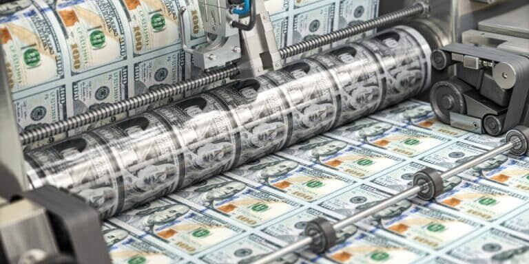 Printing,Money,Dollar,Bills,On,A,Print,Machine,In,Typography.. Printing,Money,Dollar,Bills,On,A,Print,Machine,In,Typography..