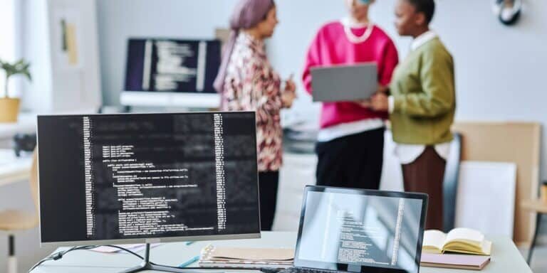 Close,Up,Of,Two,Computer,Screen,With,Code,Lines,And