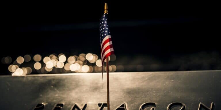 Close-up,Of,An,American,Flag,Draped,Across,The,Iconic,Pentagon