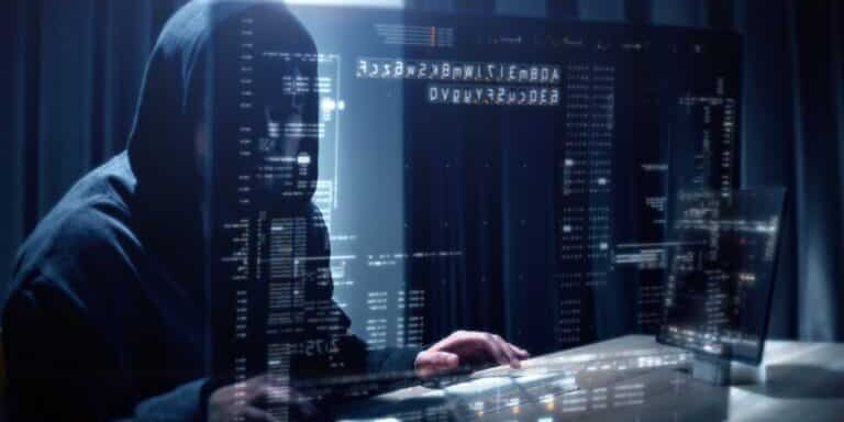 Futuristic,Cyber,Hacker,Operating,Under,The,Guise,Of,Anonymous,,Employs