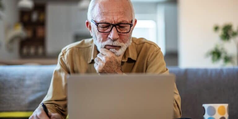 Finance,,Retirement,And,Old,Man,With,Paperwork,,Laptop,And,Budget