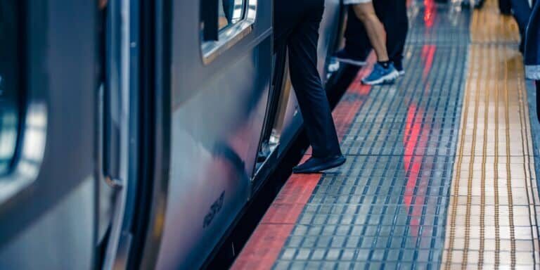 Close,Up,People,Feet,Walking,Over,The,Gap,Between,A Close,Up,People,Feet,Walking,Over,The,Gap,Between,A