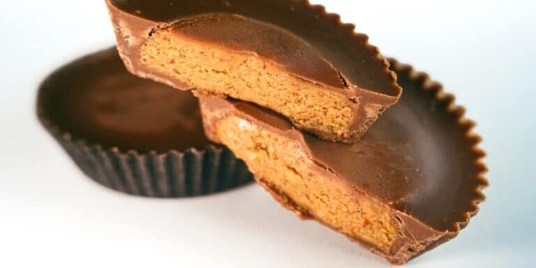 Macro,Shot,Of,Peanut,Butter,Filled,Candy,With,Chocolate,Frosting