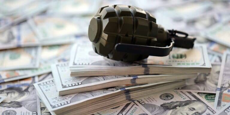 Grenade,With,A,Check,Against,The,Background,Of,Huge,Amount Grenade,With,A,Check,Against,The,Background,Of,Huge,Amount