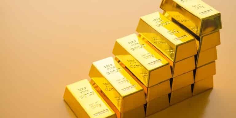 Stack,Gold,Bars,As,Rise,Up,Stairs,On,Yellow,Background. Stack,Gold,Bars,As,Rise,Up,Stairs,On,Yellow,Background.