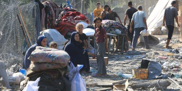 Palestinians,Inspect,Their,Destroyed,Homes,,After,An,Israeli,Airstrike,,Amid