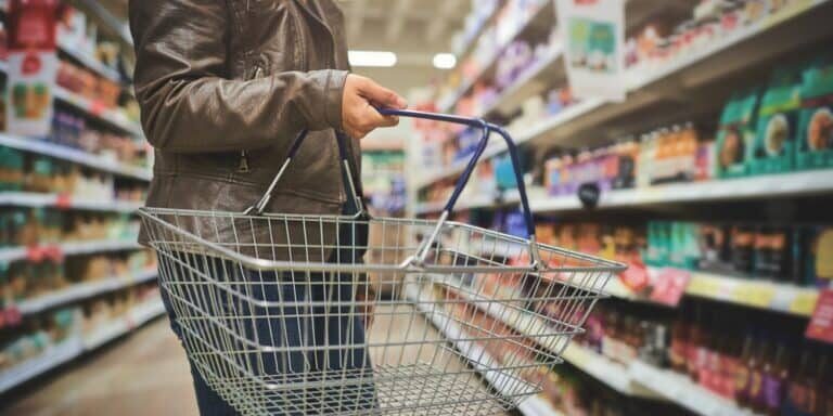 Woman,,Basket,And,Hands,Of,Customer,In,Grocery,Store,,Goods