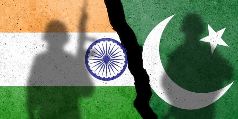 Flags,Of,India,And,Pakistan,Painted,On,The,Concrete,Wall