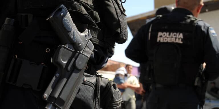 Closeup,Of,A,Handgun,Of,Mexican,Federal,Police,Forces,Maintaining