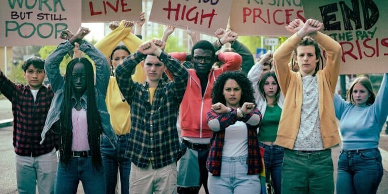 Diverse,Group,Of,Young,Protesters,Raising,Crossed,Arms,And,Holding