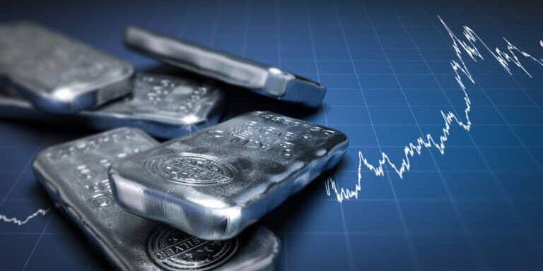 3d,Illustration,Of,Silver,Bullion,Bars,Over,A,Blue,Background