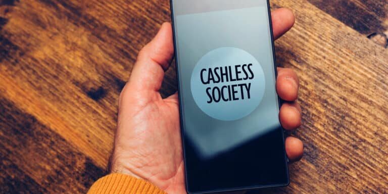 Cashless,Society,Concept,,Man,Using,Smartphone,For,Electronic,Payment,And
