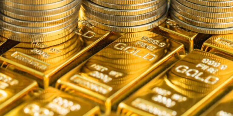 Closed,Up,Shot,Of,Shiny,Gold,Bars,With,Stack,Of