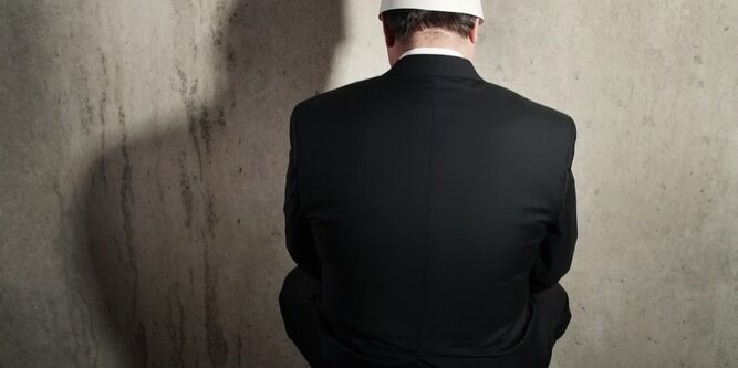 Business,Man,Wearing,A,Dunce,Cap Business,Man,Wearing,A,Dunce,Cap